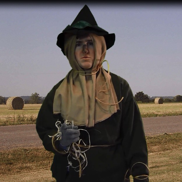 wizard of oz scarecrow with a gun scene