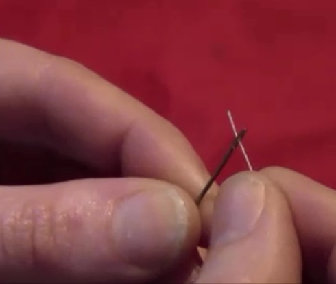How to thread a needle without sight